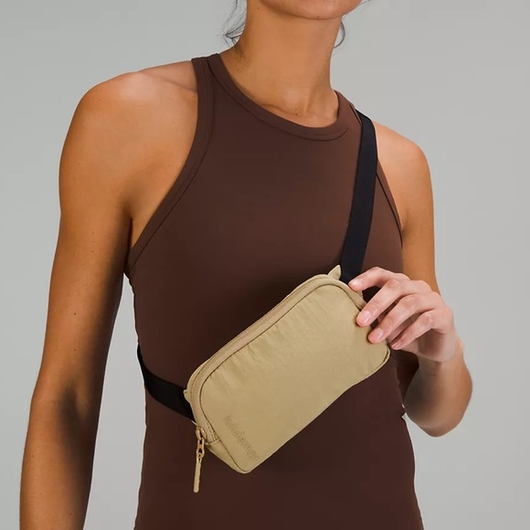 lululemon athletica Handbags - Lululemon Mini Belt Bag Trench Tan Black Unisex NWT